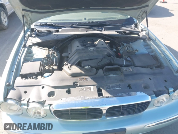 2004 Jaguar XJ 8 with VIN SAJEA71CX4SG10751, listed as a IAAI auction lot 42149348 with 89,786 mi miles and . Bid and sale history available at DreamBid. Image 10.