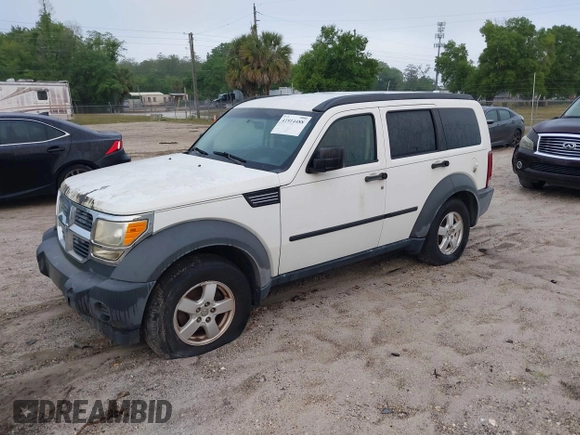 2007 Dodge Nitro SXT with VIN 1D8GT28K27W551689, listed as a IAAI auction lot 41914488 with 194,443 mi miles. Bid and sale history available at carsss.com. Image 2.