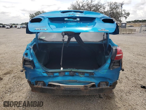 2016 Ford Focus SE z VIN 1FADP3F21GL386580, wystawiony jako Copart lot #63326425 z przebiegiem 82 139 mil mil oraz Szkoda całkowita • Salvage title. Historia ofert i sprzedaży dostępna na DreamBid. Obrazek 6.