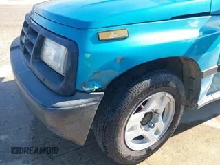 1997 Chevrolet Tracker z VIN 2CNBE1865V6904672, wystawiony jako IAAI lot #41296166 z przebiegiem 266 743 mil mil oraz . Historia ofert i sprzedaży dostępna na DreamBid. Obrazek 17.