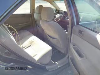 2004 Toyota Camry LE with VIN 4T1BF32K04U074276, listed as a IAAI auction lot 41940050 with 266,420 mi miles and . Bid and sale history available at DreamBid. Image 8.