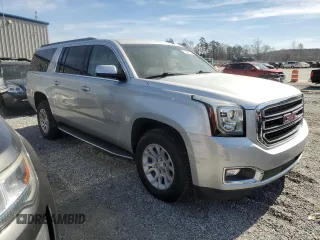 2018 GMC Yukon XL SLT with VIN 1GKS1GKCXJR328985, listed as a Copart auction lot 49485935 with 114,927 mi miles and Salvage Title. Bid and sale history available at carsss.com. Image 4.