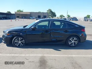 2022 Honda Civic LX z VIN 19XFL2H56NE023472, wystawiony jako IAAI lot #42257114 z przebiegiem 12 149 mil mil oraz . Historia ofert i sprzedaży dostępna na DreamBid. Obrazek 14.