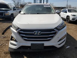 2018 Hyundai Tucson SEL z VIN KM8J33A46JU665618, wystawiony jako Copart lot #53329305 z przebiegiem 146 486 mil mil oraz Szkoda całkowita • Salvage title. Historia ofert i sprzedaży dostępna na DreamBid. Obrazek 5.