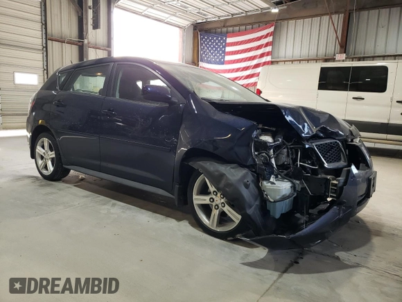 2010 Pontiac Vibe with VIN 5Y2SM6E07AZ403883, listed as a Copart auction lot 77337294 with 42,276 mi miles and Salvage Title. Bid and sale history available at carsss.com. Image 4.