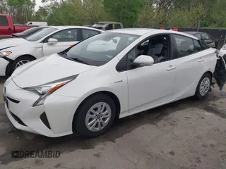 2017 Toyota Prius Two with VIN JTDKBRFUXH3036063, listed as a IAAI auction lot 42036676 with 202,873 mi miles. Bid and sale history available at carsss.com. Image 2.