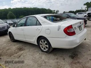 2004 Toyota Camry LE z VIN JTDBE32K440281087, wystawiony jako Copart lot #60486995 z przebiegiem 229 856 mil mil oraz Czysty tytuł • Clean title. Historia ofert i sprzedaży dostępna na DreamBid. Obrazek 2.