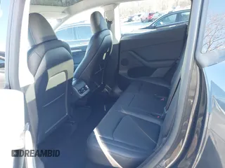 2024 Tesla Model Y Long Range with VIN 7SAYGDEE7RF199673, listed as a IAAI auction lot 41263305 with 3,137 mi miles and . Bid and sale history available at DreamBid. Image 8.