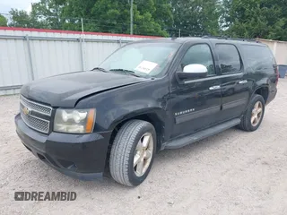 2011 Chevrolet Suburban LT with VIN 1GNSCJE07BR128885, listed as a IAAI auction lot 42456748 with 201,789 mi miles and . Bid and sale history available at DreamBid. Image 17.
