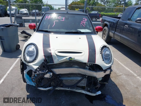 2021 MINI Convertible with VIN WMWWJ9C0XM3M07302, listed as a IAAI auction lot 42027854 with 30,921 mi miles and . Bid and sale history available at DreamBid. Image 12.