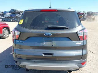 2018 Ford Escape Titanium with VIN 1FMCU0J99JUB09562, listed as a IAAI auction lot 41547659 with 63,700 mi miles and . Bid and sale history available at DreamBid. Image 16.