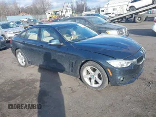 2015 BMW 4 Series 428i xDrive z VIN WBA4C9C58FD330956, wystawiony jako IAAI lot #41453506 z przebiegiem 40 988 mil mil oraz . Historia ofert i sprzedaży dostępna na DreamBid. Obrazek 1.