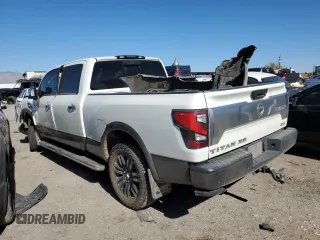 2020 Nissan Titan XD Platinum Reserve with VIN 1N6AA1FB0LN507954, listed as a Copart auction lot 80553324 with 105,207 mi miles and Salvage Title. Bid and sale history available at carsss.com. Image 2.