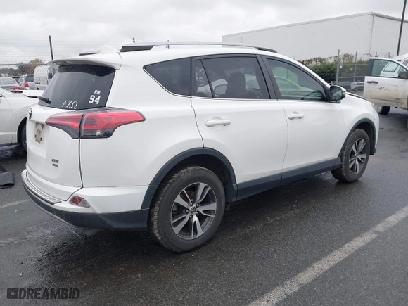 2017 Toyota RAV4 XLE with VIN JTMRFREV6HJ716907, listed as a IAAI auction lot 41056444 with 118,335 mi miles. Bid and sale history available at carsss.com. Image 4.
