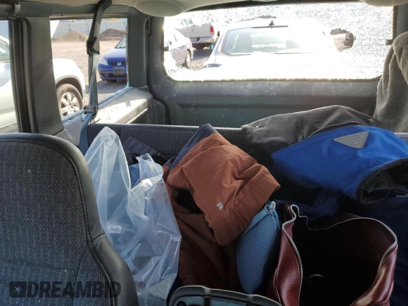 1999 Jeep Cherokee Sport with VIN 1J4FT68S1XL577603, listed as a Copart auction lot 54216115 with 180,128 mi miles and Salvage title. Bid and sale history available at DreamBid. Image 10.