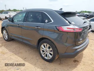 2020 Ford Edge Titanium z VIN 2FMPK4K98LBA76737, wystawiony jako IAAI lot #41981689 z przebiegiem 93 501 mil mil oraz . Historia ofert i sprzedaży dostępna na DreamBid. Obrazek 3.