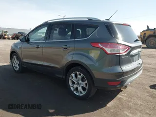 2016 Ford Escape Titanium with VIN 1FMCU9JX5GUA65412, listed as a IAAI auction lot 41859123 with 80,208 mi miles and . Bid and sale history available at DreamBid. Image 3.