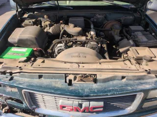 1996 GMC Suburban with VIN 1GKFK16R0TJ729179, listed as a Copart auction lot 51996035 with 206,230 mi miles and Salvage Title. Bid and sale history available at carsss.com. Image 12.
