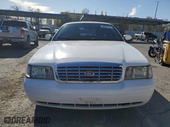 2011 Ford Crown Victoria LX z VIN 2FABP7EV1BX147343, wystawiony jako Copart lot #84844144 z przebiegiem 139 638 mil mil oraz Czysty tytuł • Clean title. Historia ofert i sprzedaży dostępna na DreamBid. Obrazek 5.