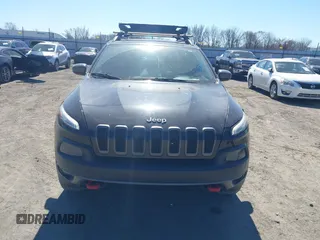 2015 Jeep Cherokee Trailhawk with VIN 1C4PJMBS5FW577470, listed as a IAAI auction lot 41565837 with 191,105 mi miles. Bid and sale history available at carsss.com. Image 12.