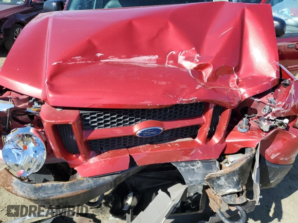2003 Ford Explorer Sport Trac XLS z VIN 1FMZU77E33UC41095, wystawiony jako Copart lot #49394895 z przebiegiem 98 578 mil mil oraz Szkoda całkowita • Salvage title. Historia ofert i sprzedaży dostępna na DreamBid. Obrazek 12.
