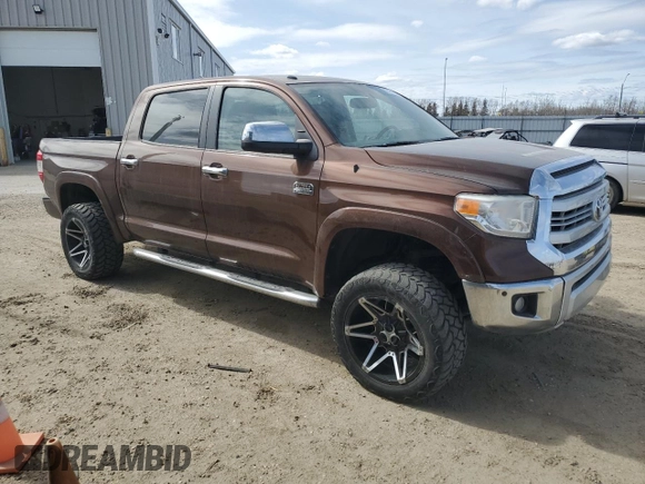 2015 Toyota Tundra 4WD Truck Platinum with VIN 5TFAY5F14FX438207, listed as a Copart auction lot 52706155 with 156,683 mi miles and Clean Title. Bid and sale history available at carsss.com. Image 4.