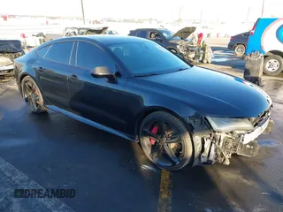 2015 Audi RS 7 Prestige z VIN WUAW2AFCXFN900446, wystawiony jako IAAI lot #41313561 z przebiegiem 87 952 mil mil oraz . Historia ofert i sprzedaży dostępna na DreamBid. Obrazek 1.