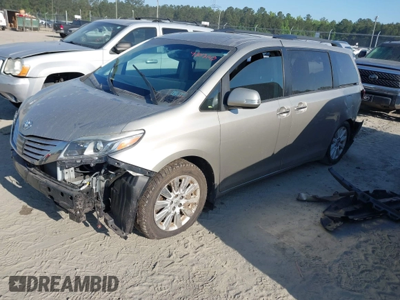 2015 Toyota Sienna XLE with VIN 5TDYK3DC0FS632909, listed as a IAAI auction lot 42012143 with 97,084 mi miles and . Bid and sale history available at DreamBid. Image 18.
