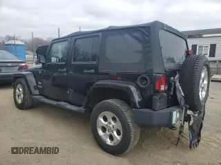 2015 Jeep Wrangler Unlimited Sahara with VIN 1C4BJWEG3FL530114, listed as a Copart auction lot 49444135 with 156,669 mi miles and Salvage Title. Bid and sale history available at carsss.com. Image 2.