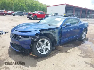 2019 Chevrolet Camaro 1LT z VIN 1G1FB1RX7K0151147, wystawiony jako IAAI lot #42179932 z przebiegiem 51 561 mil mil oraz . Historia ofert i sprzedaży dostępna na DreamBid. Obrazek 2.