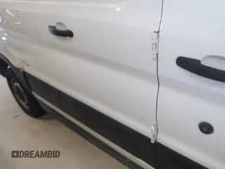 2016 Ford Transit Cargo with VIN 1FTYR1ZM5GKA09506, listed as a IAAI auction lot 42157212 with 153,592 mi miles. Bid and sale history available at carsss.com. Image 1.