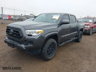 2023 Toyota Tacoma 4WD SR with VIN 3TYCZ5AN5PT157657, listed as a IAAI auction lot 41412536 with 12,828 mi miles. Bid and sale history available at carsss.com. Image 2.