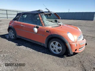 2005 MINI Convertible z VIN WMWRF33585TF62541, wystawiony jako Copart lot #49868625 z przebiegiem Nie podano mil oraz Szkoda całkowita • Salvage title. Historia ofert i sprzedaży dostępna na DreamBid. Obrazek 4.