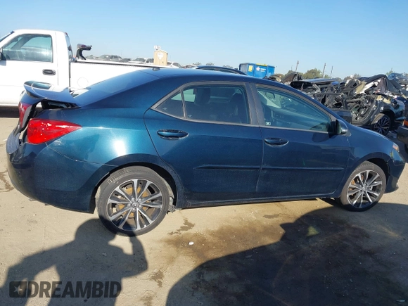 2019 Toyota Corolla L with VIN 5YFBURHE7KP922064, listed as a IAAI auction lot 41977741 with 54,896 mi miles and . Bid and sale history available at DreamBid. Image 13.