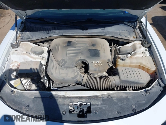 2020 Dodge Charger SXT with VIN 2C3CDXBG9LH136457, listed as a IAAI auction lot 41585590 with 61,390 mi miles and . Bid and sale history available at DreamBid. Image 10.