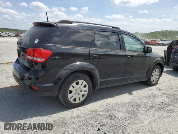 2019 Dodge Journey SE with VIN 3C4PDCBB1KT779370, listed as a Copart auction lot 53846695 with 63,623 mi miles and Salvage Title. Bid and sale history available at DreamBid. Image 3.