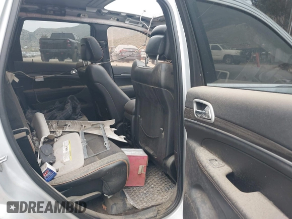 2011 Jeep Grand Cherokee Laredo with VIN 1J4RS4GG1BC646719, listed as a IAAI auction lot 42056300 with Not Provided miles and . Bid and sale history available at DreamBid. Image 8.