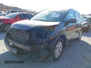 2014 Honda CR-V EX-L with VIN 2HKRM4H79EH684688, listed as a IAAI auction lot 41785089 with 106,951 mi miles. Bid and sale history available at carsss.com. Image 6.