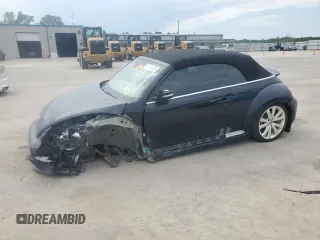 2014 Volkswagen Beetle 1.8T w/Premium z VIN 3VW517AT6EM816698, wystawiony jako Copart lot #57344055 z przebiegiem 52 782 mil mil oraz Szkody całkowita. Historia ofert i sprzedaży dostępna na DreamBid. Obrazek 1.