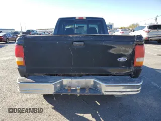 1997 Ford Ranger XLT with VIN 1FTCR15X2VPA50685, listed as a Copart auction lot 81790574 with 128,458 mi miles and Salvage Title. Bid and sale history available at DreamBid. Image 6.