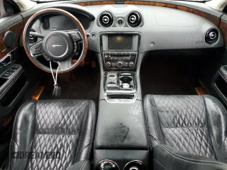 2016 Jaguar XJ Portfolio with VIN SAJWJ2GD8G8W02010, listed as a Copart auction lot 79011404 with Not Provided miles and Salvage Title. Bid and sale history available at DreamBid. Image 8.