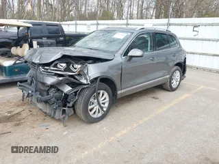 2016 Volkswagen Touareg Sport with VIN WVGEF9BPXGD012206, listed as a IAAI auction lot 42115314 with Not Provided miles and . Bid and sale history available at DreamBid. Image 2.