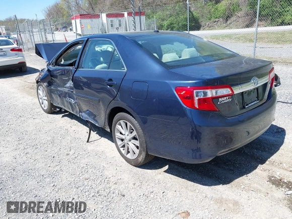 2014 Toyota Camry L with VIN 4T4BF1FK5ER439394, listed as a IAAI auction lot 41978373 with 74,891 mi miles. Bid and sale history available at carsss.com. Image 3.