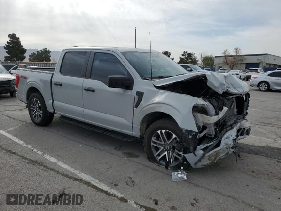 2023 Ford F-150 XL with VIN 1FTEW1CP4PKF86851, listed as a Copart auction lot 50611185 with 15,773 mi miles and Salvage Title. Bid and sale history available at DreamBid. Image 4.