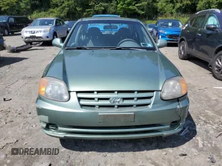 2005 Hyundai Accent GLS with VIN KMHCG45C35U622963, listed as a Copart auction lot 68292114 with 137,655 mi miles and Salvage Title. Bid and sale history available at carsss.com. Image 5.