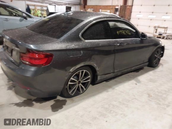 2020 BMW 2 Series 230i xDrive with VIN WBA2J3C07L7E64031, listed as a IAAI auction lot 41458356 with 43,594 mi miles. Bid and sale history available at carsss.com. Image 4.