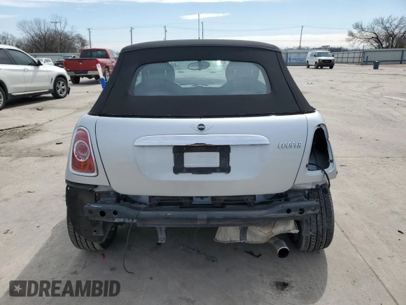 2011 MINI Convertible with VIN WMWZN3C53BTZ89332, listed as a Copart auction lot 45945515 with 25,809 mi miles and Salvage title. Bid and sale history available at DreamBid. Image 6.