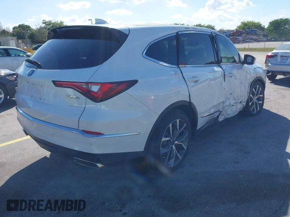 2023 Acura MDX w/Technology Package with VIN 5J8YD9H49PL005534, listed as a IAAI auction lot 41597347 with 14,950 mi miles. Bid and sale history available at carsss.com. Image 4.