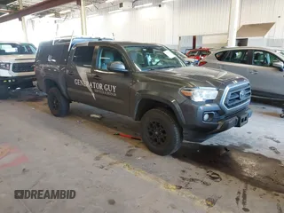 2020 Toyota Tacoma SR5 with VIN 3TMCZ5AN0LM327915, listed as a IAAI auction lot 41870404 with 138,029 mi miles and . Bid and sale history available at DreamBid. Image 1.