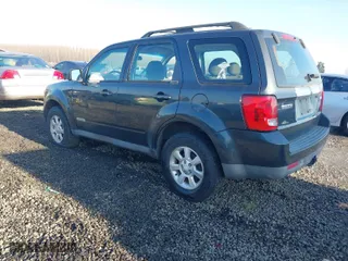 2008 Mazda Tribute Touring with VIN 4F2CZ96168KM05738, listed as a IAAI auction lot 41403675 with 217,593 mi miles. Bid and sale history available at carsss.com. Image 3.